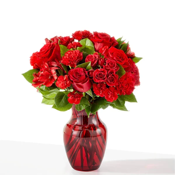 Red Red Wine Red Roses, Red Mini Carnations and designer choice filler. Red Red Wine floral bouquet will scream "stay close to me. I want to be your love".